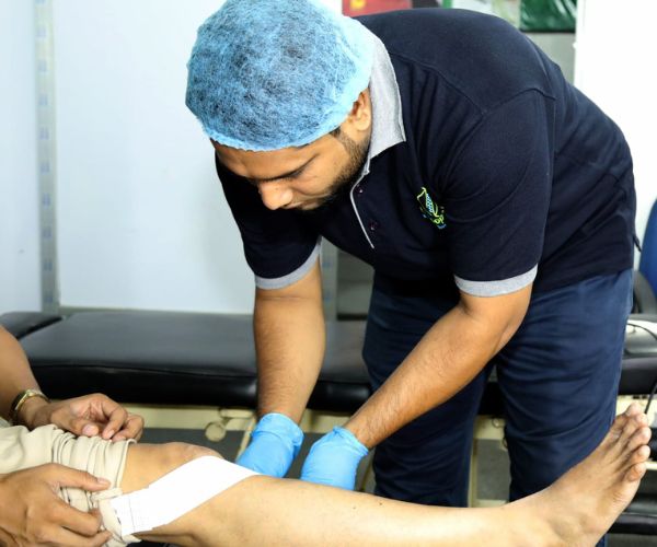 kt taping chiropractic & osteopathic centre Chiropractic Care